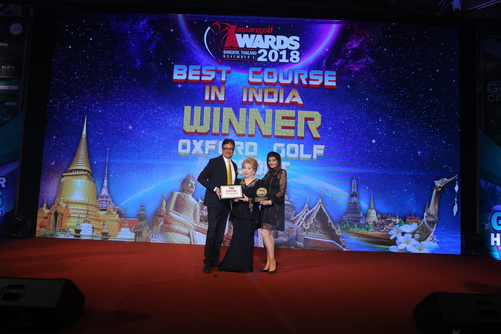 Mr & Mrs Seolekar receiving the award with Mrs Sebastian