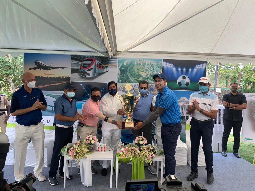 Arjun Nowahar, of BPGC receiving the winning trophy