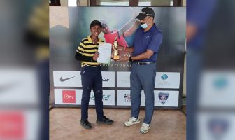 Tournament Director Ajay Kumar D (R) giving away prizes to the winners