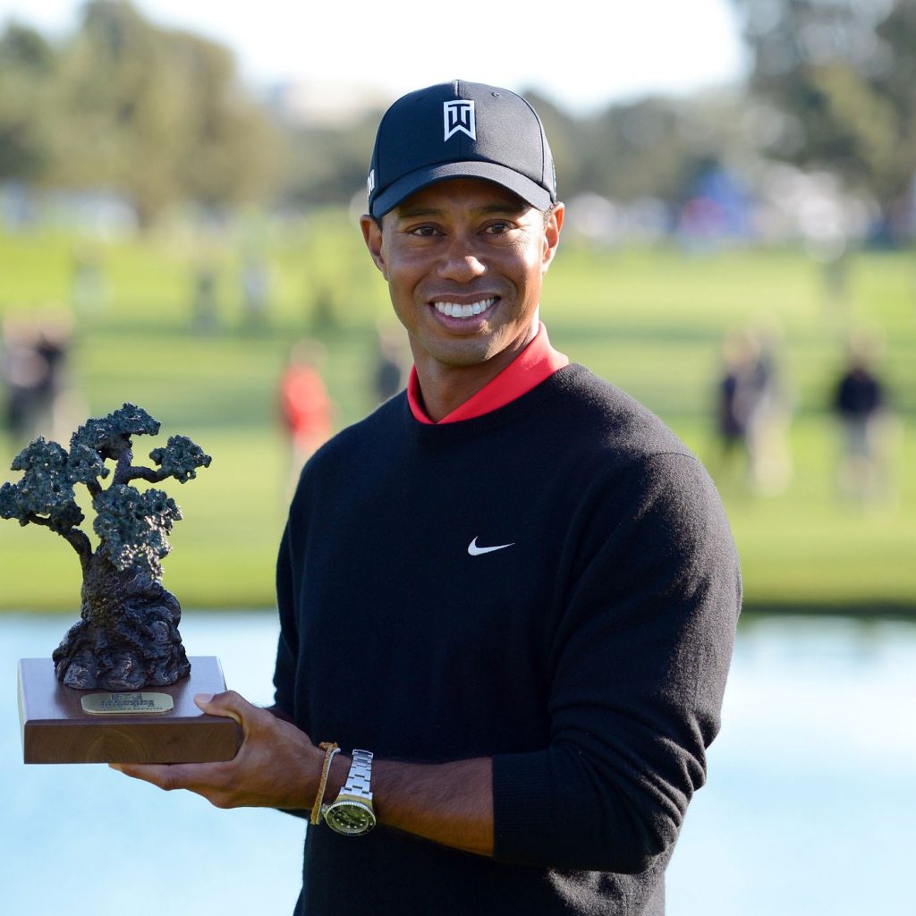 Tiger Woods after winning the 2013 Famers Insurance Open