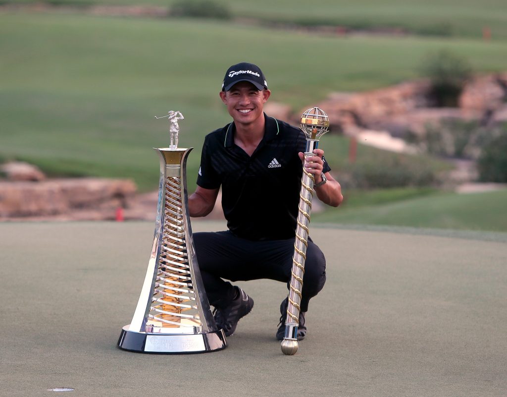 Collin Morikawa poses with his European double